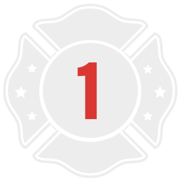 A red number one on a grey and white outline of a firefighter badge.