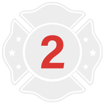 A red number two on a grey and white outline of a firefighter badge by FireTech.